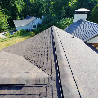 Roofing and gutters by Impact Siding and Roofing